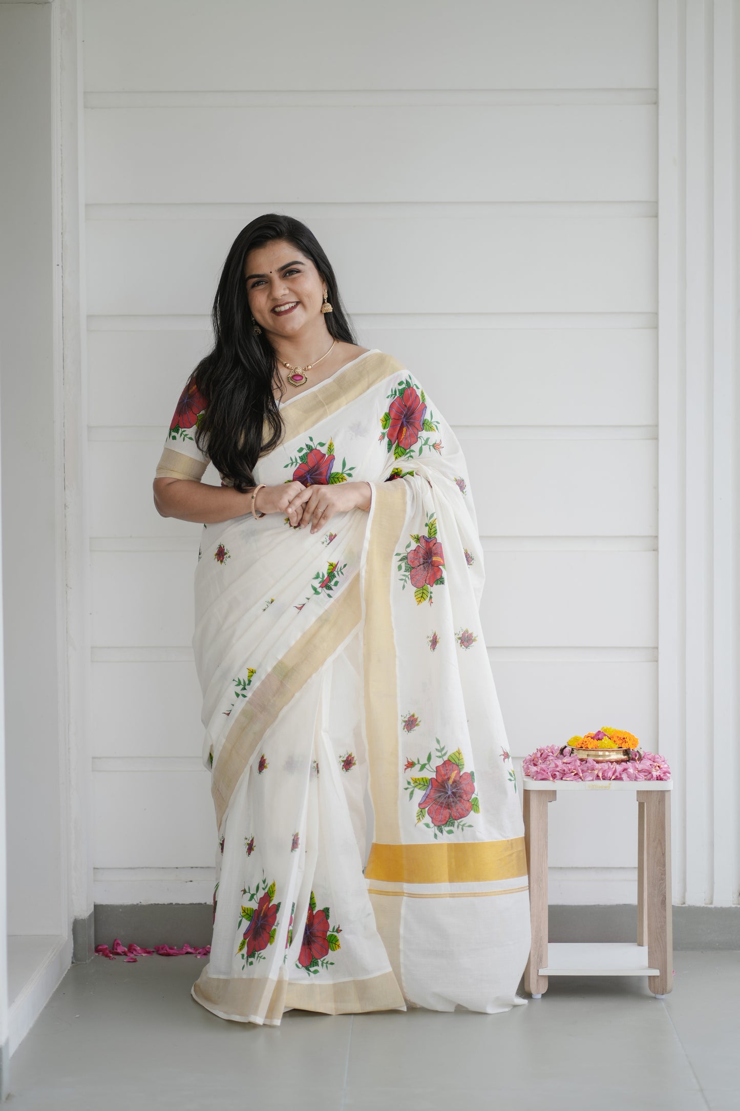 Kerala Kasavu Saree with Red Floral Print