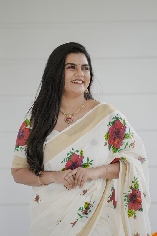 Kerala Kasavu Saree with Red Floral Print
